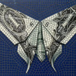 Silver Moth Mosaic Art on Blue Background