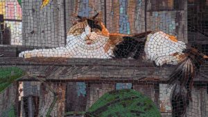 Mosaic Art: Serene Tricolor Cat on a Ledge